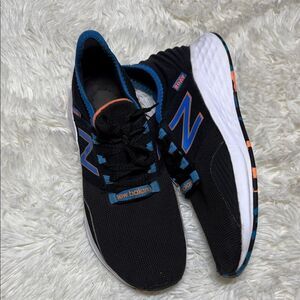 New Balance woman’s Black and Blue Athletic Shoes